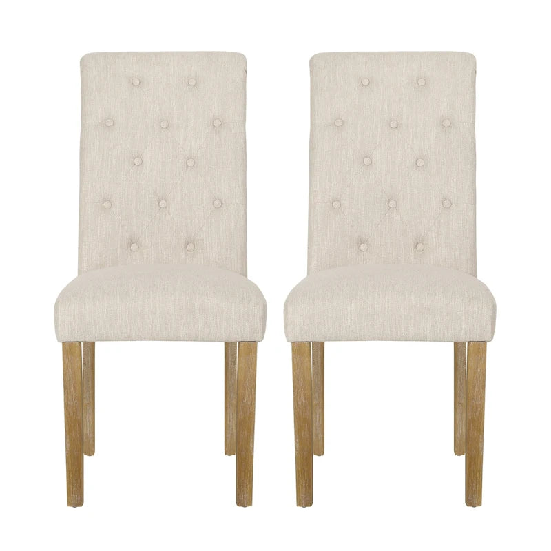 Chaises de salle à manger capitonnées (deux chaises par lot).