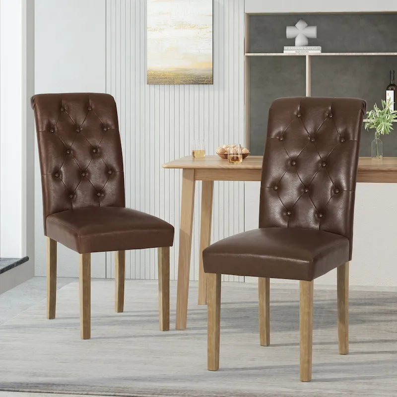 Chaises de salle à manger capitonnées (deux chaises par lot).