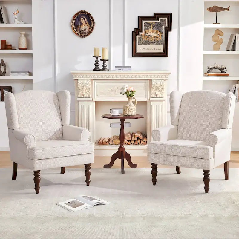 Deux fauteuils décoratifs à pieds inclinés