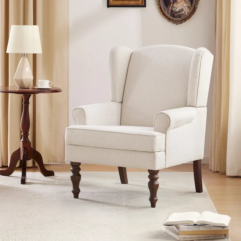 Deux fauteuils décoratifs à pieds inclinés