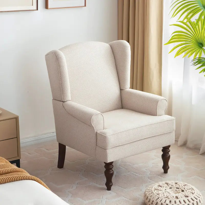 Deux fauteuils décoratifs à pieds inclinés
